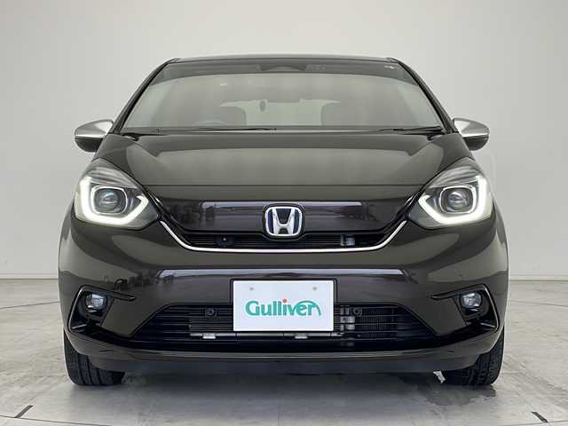 ホンダ フィット e:HEVリュクス 愛知県 2020(令2)年 4.7万km 茶 ホンダセンシング/衝突軽減システム/純正８型SDナビ/レーダークルーズコントロール/シートヒーター/フルセグ/CD/DVD/Bluetooth/バックカメラ/コーナーセンサー/純正アルミホイール/LEDヘッドライト/ステアリングヒーター/オートマチックハイビーム/ドライブレコーダー/ETC/ステアリングスイッチ/スマートキー/プッシュスタート