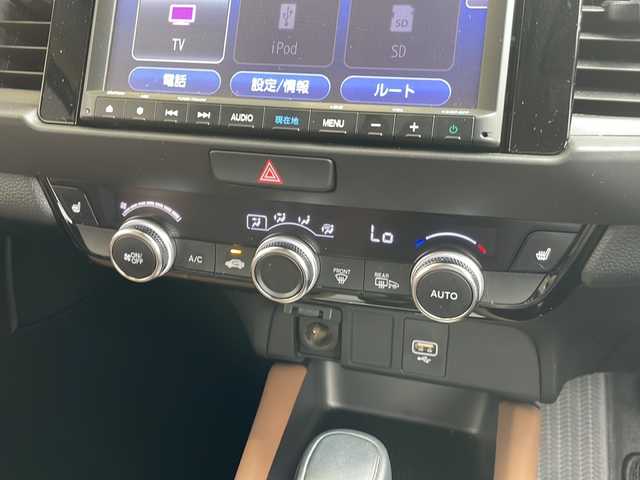 ホンダ フィット e:HEVリュクス 愛知県 2020(令2)年 4.7万km 茶 ホンダセンシング/衝突軽減システム/純正８型SDナビ/レーダークルーズコントロール/シートヒーター/フルセグ/CD/DVD/Bluetooth/バックカメラ/コーナーセンサー/純正アルミホイール/LEDヘッドライト/ステアリングヒーター/オートマチックハイビーム/ドライブレコーダー/ETC/ステアリングスイッチ/スマートキー/プッシュスタート