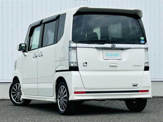 ホンダ Ｎ ＢＯＸ カスタム G ターボ Aパッケージ 熊本県 2014(平26)年 6万km プレミアムホワイトパール 純正ＳＤナビ/・AM/FM/CD/DVD/USB/SD/AUX/iPod/BT/・ワンセグTV/バックカメラ/シティブレーキアクティブシステム/クルーズコントロール/革巻きステアリング/・ステアリングリモコン/オートライト/・HIDライト/・フォグランプ/電動格納ミラー/・ウィンカーミラー/純正アルミホイール/純正フロアマット/スマートキー