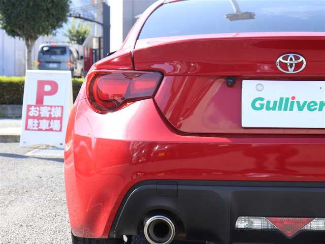 トヨタ ８６ GT 神奈川県 2014(平26)年 7.2万km ライトニングレッド 社外メモリナビ/フルセグテレビ/バックカメラ/プッシュスタート/ETC/モデリスタエアロ/フロント、サイド/社外18インチAW/純正LEDヘッドライト/純正フロアマット/保証書/取説/記録簿(H27/29/R1/3/5)