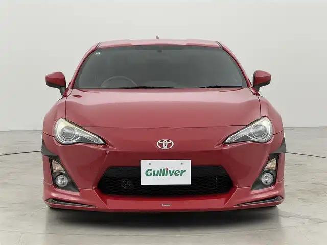 トヨタ ８６ GT 福岡県 2014(平26)年 7.2万km ライトニングレッド モデリスタエアロ　/社外ナビ（Ｂｌｕｅｔｏｏｔｈ，フルセグＴＶ）　/バックカメラ　/ＥＴＣ　/横滑り防止　/プッシュスタート　/スマートキー　/純正フロアマット　/オートライト　/社外１８インチアルミホイール　/６ＭＴ/GReddy車高調/TOM`ｓリアテールランプ