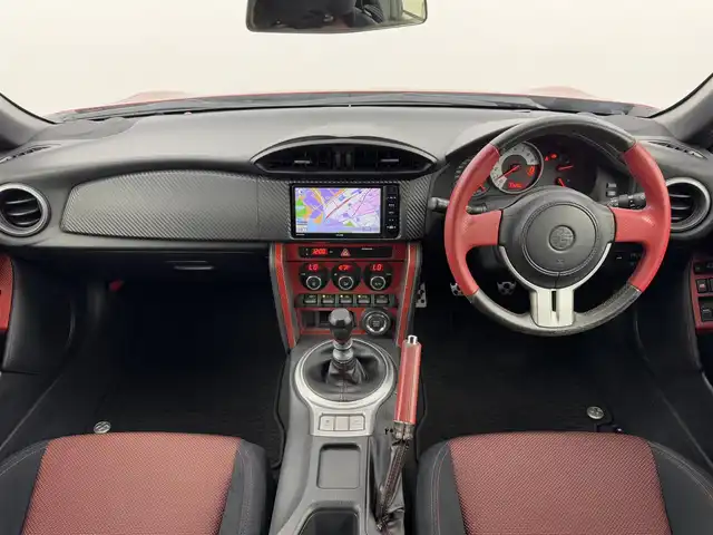 トヨタ ８６ GT 福岡県 2014(平26)年 7.2万km ライトニングレッド モデリスタエアロ　/社外ナビ（Ｂｌｕｅｔｏｏｔｈ，フルセグＴＶ）　/バックカメラ　/ＥＴＣ　/横滑り防止　/プッシュスタート　/スマートキー　/純正フロアマット　/オートライト　/社外１８インチアルミホイール　/６ＭＴ/GReddy車高調/TOM`ｓリアテールランプ