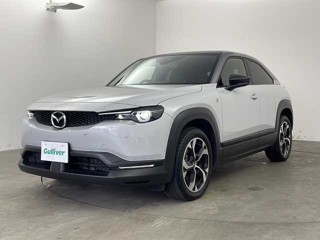 マツダ ＭＸ－３０ロータリーＥＶ ナチュラルモノトーン 兵庫県 2023(令5)年 0.6万km セラミックメタリック ・純正10.25インチセンターディスプレイ/ナビ/TV/USB/Bluetooth/スマホ連携/・360°ビューモニター/・BOSEサウンドシステム/・AC100V電源/・アクティブドライビングディスプレイ/・スマートブレーキサポート/・誤発進抑制制御/・レーンキープアシスト/・レーダークルーズコントロール/・ブラインドスポットモニタリング/・後側方接近車両検知/・ハイビームコントロールシステム/・車線逸脱警報システム/・ドライバーアテンションアラート/・ＬＥＤヘッドライト/・オートライト/・ハーフレザー/・シートヒーター/・運転席パワーシート/・ステアリングヒーター/・パドルシフト/・ステアリングスイッチ/・純正18インチアルミホイール/・アドバンストキー/・プッシュスタート