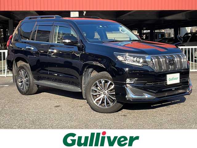 トヨタ ランドクルーザー プラド TX Lパッケージ 神奈川県 2020(令2)年 4.6万km ブラック ワンオーナー		/モデリスタフロントスポイラー/純正SDナビ【NSZT-W68T】/・DTV/SD/CD/DVD/SDREC/BT			/バックカメラ/クリアランスソナー/電動ムーンルーフ/ルーフレール/黒革シート/前席パワーシート/前席シートヒーター/エアシート/純正19インチAW	/ビルトインETC2.0/前側ドライブレコーダー/ToyotaSafetySense/・プリクラッシュセーフティ/・レーンデパーチャーアラート/・レーダークルーズコントロール/・オートマチックハイビーム	/オートライト				/純正LEDヘッドライト		/フォグランプ	/センターデフロックスイッチ/ダウンヒルコントロールスイッチ	/プッシュEgスタート/ストップ/スマートキー×2		/サイド/カーテン/ニーエアバック		/ターンランプ付電動格納ドアミラー/ドアバイザー/純正フロアマット		/取扱説明書/ナビ取扱説明書	/新車時保証書