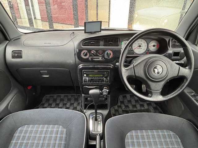 ダイハツ ミラ ジーノ ミニライトスペシャル 宮城県 2001(平13)年 7.1万km ホワイトパールマイカ 登録時走行距離70753km/リモコンキー/AC/CD・MD・AM・FM・社外ナビ/フォグランプ/ハロゲン/社外ホイル/社外フロアマット