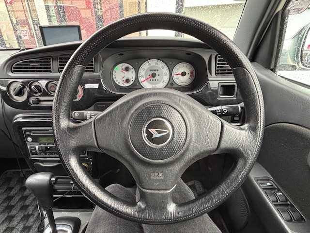 ダイハツ ミラ ジーノ ミニライトスペシャル 宮城県 2001(平13)年 7.1万km ホワイトパールマイカ 登録時走行距離70753km/リモコンキー/AC/CD・MD・AM・FM・社外ナビ/フォグランプ/ハロゲン/社外ホイル/社外フロアマット