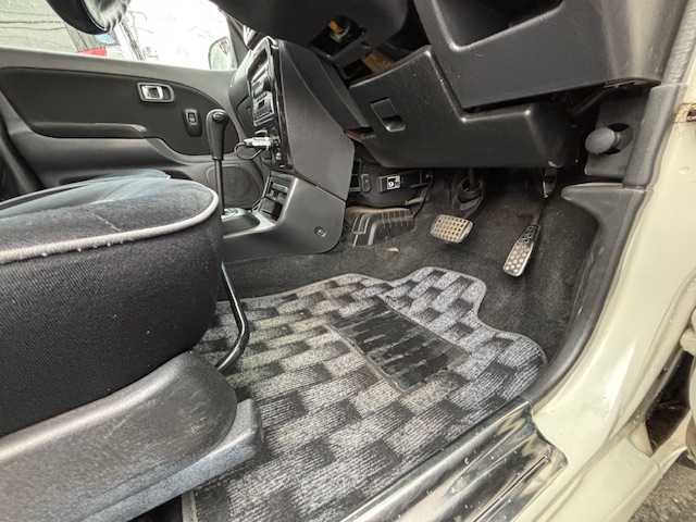 ダイハツ ミラ ジーノ ミニライトスペシャル 宮城県 2001(平13)年 7.1万km ホワイトパールマイカ 登録時走行距離70753km/リモコンキー/AC/CD・MD・AM・FM・社外ナビ/フォグランプ/ハロゲン/社外ホイル/社外フロアマット