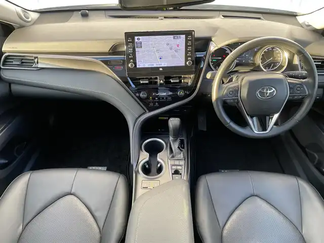 トヨタ カムリ WSレザーパッケージ 福岡県 2023(令5)年 4.5万km アティチュードブラックマイカ/プラチナホワイトパールマイカ パノラマルーフ/ＧＲエアロ(F.S.R)/ＪＢＬサウンド/純正９インチＤＡナビ/フルセグ/BT/AM/FM/Miracast/applecarplay/androidauto/トヨタセーフティセンス/PCS/LDA/RCTA/クリアランスソナー/PKSB/黒革シート/バックカメラ/D/Nシートヒーター/D/Nパワーシート/ＢＳＭ/ＨＵＤ/パドルシフト/革巻ステアリング/純正アルミ/レーダークルーズコントロール/LEDオートライト/オートハイビーム/フォグランプ/ワイヤレス充電/ステアリングスイッチ/テレビキャンセラー/電動パーキング/ブレーキホールド/ビルトインETC2.0/スマートキー/プッシュスタート/電格ミラー/ドアバイザー/AC100V