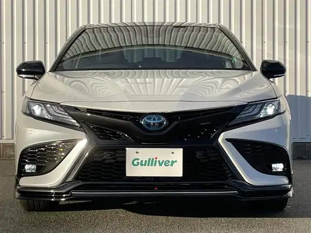 トヨタ カムリ WSレザーパッケージ 福岡県 2023(令5)年 4.5万km アティチュードブラックマイカ/プラチナホワイトパールマイカ パノラマルーフ/ＧＲエアロ(F.S.R)/ＪＢＬサウンド/純正９インチＤＡナビ/フルセグ/BT/AM/FM/Miracast/applecarplay/androidauto/トヨタセーフティセンス/PCS/LDA/RCTA/クリアランスソナー/PKSB/黒革シート/バックカメラ/D/Nシートヒーター/D/Nパワーシート/ＢＳＭ/ＨＵＤ/パドルシフト/革巻ステアリング/純正アルミ/レーダークルーズコントロール/LEDオートライト/オートハイビーム/フォグランプ/ワイヤレス充電/ステアリングスイッチ/テレビキャンセラー/電動パーキング/ブレーキホールド/ビルトインETC2.0/スマートキー/プッシュスタート/電格ミラー/ドアバイザー/AC100V