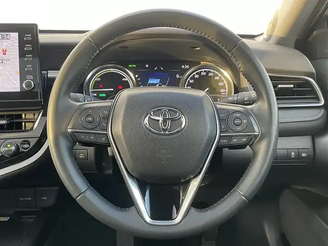 トヨタ カムリ WSレザーパッケージ 福岡県 2023(令5)年 4.5万km アティチュードブラックマイカ/プラチナホワイトパールマイカ パノラマルーフ/ＧＲエアロ(F.S.R)/ＪＢＬサウンド/純正９インチＤＡナビ/フルセグ/BT/AM/FM/Miracast/applecarplay/androidauto/トヨタセーフティセンス/PCS/LDA/RCTA/クリアランスソナー/PKSB/黒革シート/バックカメラ/D/Nシートヒーター/D/Nパワーシート/ＢＳＭ/ＨＵＤ/パドルシフト/革巻ステアリング/純正アルミ/レーダークルーズコントロール/LEDオートライト/オートハイビーム/フォグランプ/ワイヤレス充電/ステアリングスイッチ/テレビキャンセラー/電動パーキング/ブレーキホールド/ビルトインETC2.0/スマートキー/プッシュスタート/電格ミラー/ドアバイザー/AC100V