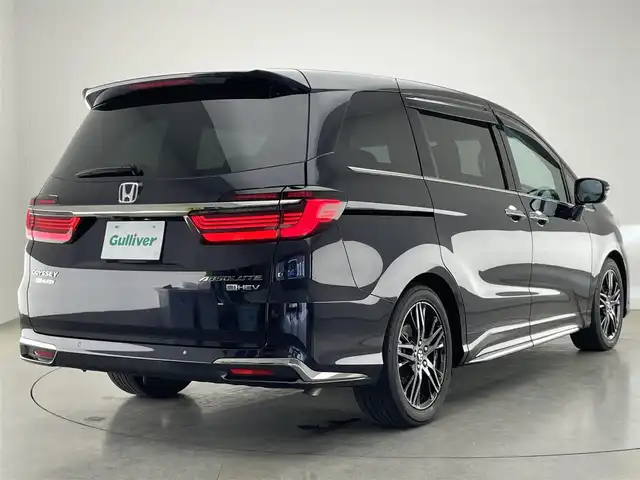 ホンダ オデッセイ ハイブリッド e:HEVアブソルート EX 愛知県 2022(令4)年 7.6万km プレミアムヴィーナスブラックP 純正１０型ナビ　フルセグＴＶ　ＨＤＭＩ　ＵＳＢ　純正１２．８型後席モニター　全方位カメラ　ナビ連動前後ドラレコ　パーキングアシスト　ホンダセンシング　衝突軽減装置　追従クルコン　シートヒーター LEDオートライト　オットマン　コーナーセンサー　BSM　カープレイ対応ナビ　TVキャンセラー　禁煙車