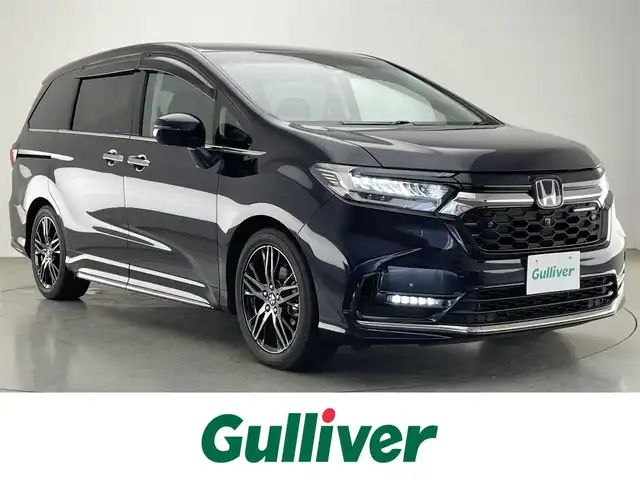 ホンダ オデッセイ ハイブリッド e:HEVアブソルート EX 愛知県 2022(令4)年 7.6万km プレミアムヴィーナスブラックP 純正１０型ナビ　フルセグＴＶ　ＨＤＭＩ　ＵＳＢ　純正１２．８型後席モニター　全方位カメラ　ナビ連動前後ドラレコ　パーキングアシスト　ホンダセンシング　衝突軽減装置　追従クルコン　シートヒーター LEDオートライト　オットマン　コーナーセンサー　BSM　カープレイ対応ナビ　TVキャンセラー　禁煙車