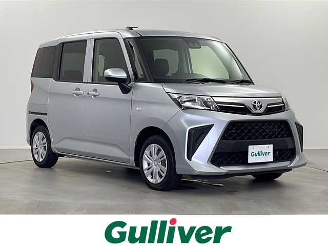 トヨタ ルーミー X 栃木県 2022(令4)年 1.4万km ブライトシルバーM 純正オーディオ/（CD/AM/FM/AUX/USB）/スマートアシスト/　衝突軽減ブレーキ/　誤発進抑制/　車線逸脱警報/　オートハイビーム/オートライト/ハロゲンヘッドライト/片側パワースライドドア/マニュアルエアコン/フロアマット/スマートキー×1本/Wエアバッグ