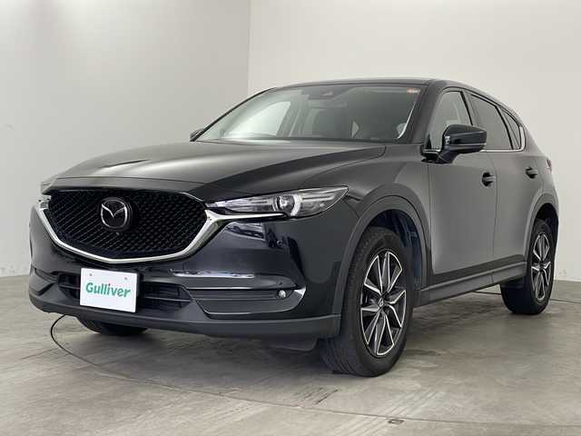 マツダ ＣＸ－５ XD Lパッケージ 兵庫県 2018(平30)年 7万km ジェットブラックマイカ ・純正SDナビ&Bluetoothオーディオ&CD/DVD再生&USB接続&TV/・アラウンドビューモニター/・フリップダウンモニター/・ビルトインETC2.0/・レーダークルーズコントロール/・レーンキープアシスト/・衝突被害軽減ブレーキ/・BOZEプレミアムサウンド/・電動リアゲート/・純正フロアマット/・パワーシート（運転席・助手席）/・シートヒーター（運転席・助手席）/・レザーシート/・ステアリングヒーター/・ステアリングスイッチ/・革巻きステアリング/・純正19インチアルミホイール/・オートライト/・LEDヘッドライト/・アイドリングストップ/・ABS/・横滑り防止機能/・盗難防止装置/・W＋サイドエアバック/・エンジンスタートボタン/・スマートキー