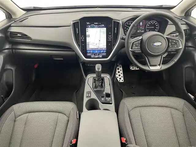 スバル クロストレック リミテッド 富山県 2023(令5)年 1.8万km クリスタルホワイトP 純正11.6型ナビ（AM/FM/BT/USB/フルセグ）/バックカメラ/ドライブレコーダー/ETC/D/N席パワーシート/D席メモリシート/シートヒーター/ハンドルヒーター/衝突被害軽減システム/レーダークルーズコントロール/レーンキープアシスト/コーナーセンサー/横滑り防止装置/純正アルミホイール/純正フロアマット/オートLEDライト/電子パーキング/革巻きステアリング/ステアリングスイッチ/パドルシフト/スマートキー/スペアキー