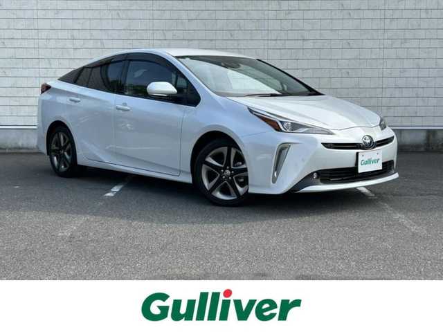 トヨタ プリウス A ツーリングセレクション 大阪府 2021(令3)年 2.6万km プラチナホワイトパールマイカ ９インチナビ　/フルセグ　/Ｂｌｕｅｔｏｏｔｈ　/全方位カメラ　/レザーシート　/シートヒーター　/ヘッドアップディスプレイ　/パーキングアシスト　/ＡＣ１００Ｖ　/ブラインドスポットモニター　/ＥＴＣ　/マット　/バイザー/スマートキー