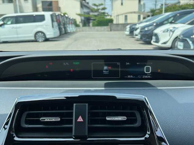 トヨタ プリウス A ツーリングセレクション 大阪府 2021(令3)年 2.6万km プラチナホワイトパールマイカ ９インチナビ　/フルセグ　/Ｂｌｕｅｔｏｏｔｈ　/全方位カメラ　/レザーシート　/シートヒーター　/ヘッドアップディスプレイ　/パーキングアシスト　/ＡＣ１００Ｖ　/ブラインドスポットモニター　/ＥＴＣ　/マット　/バイザー/スマートキー