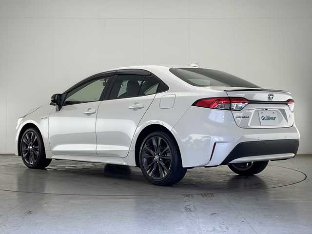 トヨタ カローラ ハイブリット ダブルバイビー 宮崎県 2020(令2)年 2.4万km ホワイトパールクリスタルシャイン Toyota Safety Sense/〇プリクラシュセーフティ/〇レーントレーシングアシスト/〇ブラインドスポットモニター/〇リアクロストラフィックアラート/〇クリアランスソナー/〇パーキングサポートブレーキ/〇ロードサインアシスト/〇レーダークルーズコントロール/〇オートマチックハイビーム/〇先行車発進告知/スペアタイヤ/純正9インチディスプレイオーディオ/フルセグTV/バックカメラ/ハーフレザーシート/シートヒーター/ステアリングヒーター/LEDヘッドライト/純正17インチＡＷ/スマートキー×2