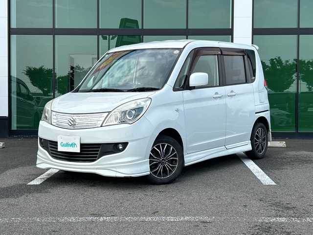 スズキ ソリオ X 和歌山県 2011(平23)年 9.5万km パールホワイト Carrozzeriaフローティングナビ/フルセグTV/CD/DVD/バックカメラ/ETC/左側パワースライドドア/オートライト/フォグランプ/社外14インチAW/ドアバイザー/電格ミラー/プッシュスタート/スマートキー/スペアキー