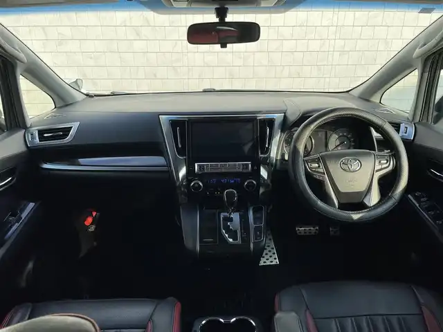 トヨタ ヴェルファイア Z Aエディション 愛知県 2015(平27)年 8.2万km ホワイトパールクリスタルシャイン TEIN車高調/モデリスタフロントグリル/ETC/USB/HDMI接続/クルーズコントロール/両側パワースライドドア/ツインムーンルーフ/純正フロアマット/ウォークスルー（2列目）/オットマン（N、2列目）/純正18インチアルミホイール/LEDヘッドライト/コーナーセンサー/横滑り防止装置/衝突軽減ブレーキ/MTモード付きAT/AC100V/全席オートエアコン/スマートキー/プッシュスタート