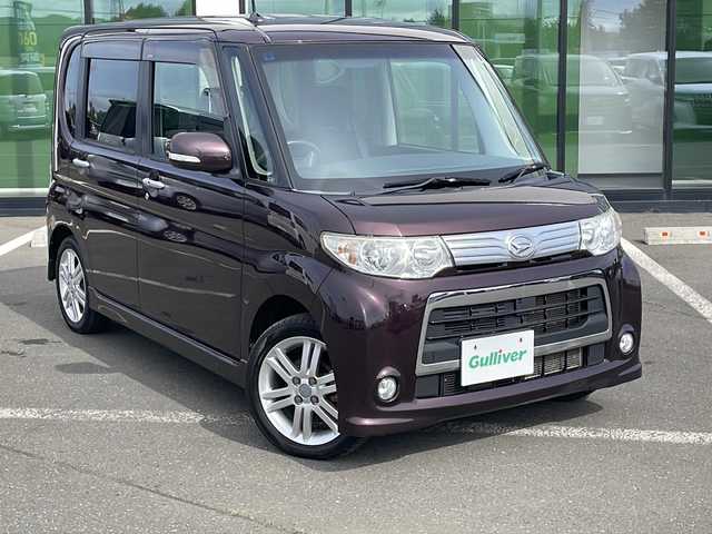 ダイハツ タント カスタム RS 道東・釧路十勝 2013(平25)年 9.4万km ミスティックレッドクリスタルメタリック ・４WD/・社外7インチナビ/（CD・DVD・BT・USB・iPod・SD・フルセグ）/・片側パワースライドドア/・ETC/・社外エンジンスターター/・純正フロアマット/・HIDヘッドライト/・スマートキー/・アイドリングストップ/・ドアバイザー/・純正アルミホイール付夏タイヤ積み込み/（165/55/15 2021年製造5mm)
