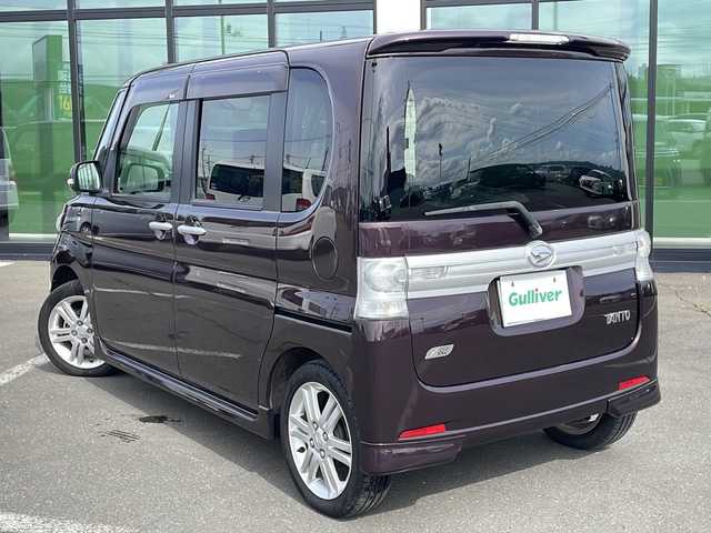 ダイハツ タント カスタム RS 道東・釧路十勝 2013(平25)年 9.4万km ミスティックレッドクリスタルメタリック ・４WD/・社外7インチナビ/（CD・DVD・BT・USB・iPod・SD・フルセグ）/・片側パワースライドドア/・ETC/・社外エンジンスターター/・純正フロアマット/・HIDヘッドライト/・スマートキー/・アイドリングストップ/・ドアバイザー/・純正アルミホイール付夏タイヤ積み込み/（165/55/15 2021年製造5mm)