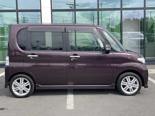 ダイハツ タント カスタム RS 道東・釧路十勝 2013(平25)年 9.4万km ミスティックレッドクリスタルメタリック ・４WD/・社外7インチナビ/（CD・DVD・BT・USB・iPod・SD・フルセグ）/・片側パワースライドドア/・ETC/・社外エンジンスターター/・純正フロアマット/・HIDヘッドライト/・スマートキー/・アイドリングストップ/・ドアバイザー/・純正アルミホイール付夏タイヤ積み込み/（165/55/15 2021年製造5mm)