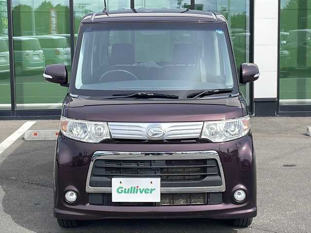 ダイハツ タント カスタム RS 道東・釧路十勝 2013(平25)年 9.4万km ミスティックレッドクリスタルメタリック ・４WD/・社外7インチナビ/（CD・DVD・BT・USB・iPod・SD・フルセグ）/・片側パワースライドドア/・ETC/・社外エンジンスターター/・純正フロアマット/・HIDヘッドライト/・スマートキー/・アイドリングストップ/・ドアバイザー/・純正アルミホイール付夏タイヤ積み込み/（165/55/15 2021年製造5mm)