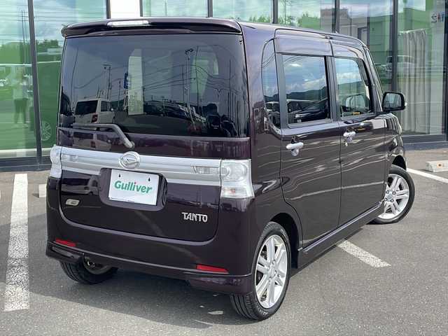 ダイハツ タント カスタム RS 道東・釧路十勝 2013(平25)年 9.4万km ミスティックレッドクリスタルメタリック ・４WD/・社外7インチナビ/（CD・DVD・BT・USB・iPod・SD・フルセグ）/・片側パワースライドドア/・ETC/・社外エンジンスターター/・純正フロアマット/・HIDヘッドライト/・スマートキー/・アイドリングストップ/・ドアバイザー/・純正アルミホイール付夏タイヤ積み込み/（165/55/15 2021年製造5mm)