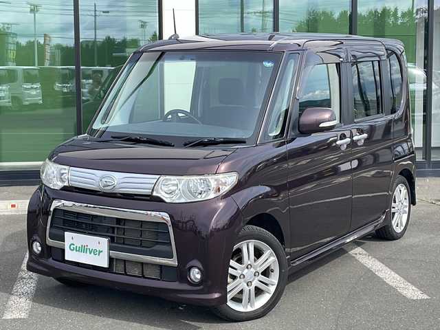ダイハツ タント カスタム RS 道東・釧路十勝 2013(平25)年 9.4万km ミスティックレッドクリスタルメタリック ・４WD/・社外7インチナビ/（CD・DVD・BT・USB・iPod・SD・フルセグ）/・片側パワースライドドア/・ETC/・社外エンジンスターター/・純正フロアマット/・HIDヘッドライト/・スマートキー/・アイドリングストップ/・ドアバイザー/・純正アルミホイール付夏タイヤ積み込み/（165/55/15 2021年製造5mm)