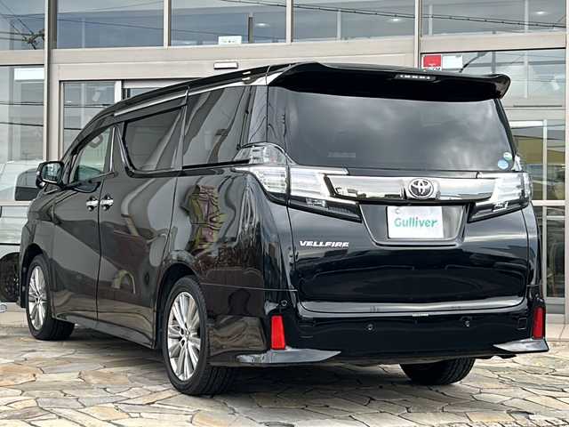 トヨタ ヴェルファイア Z Aエディション ゴールデンアイズ 静岡県 2017(平29)年 6.6万km ブラック 純正ナビ/・TV/・CD/DVD/・SD録音/・Bluetooth/・AM/FM/・USB/・HDMI/主要装備/・バックカメラ/・後席フリップダウンモニター/・ツインムーンルーフ/・両側パワスラ/・レーダークルコン/・ハーフレザーシート/・デジタルインナーミラー/・プリクラッシュセーフティ/・クリアランスソナー/・ETC2.0/・サイドカーテンエアバッグ/・リアオートエアコン