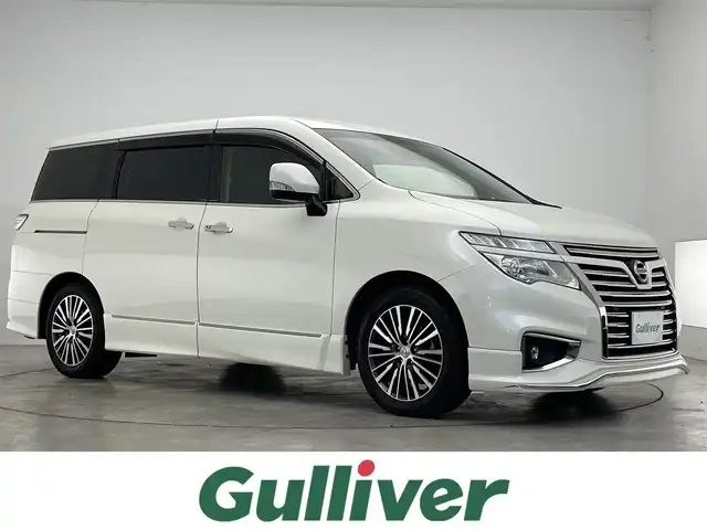 日産 エルグランド 250ハイウェイスター プレミアム 滋賀県 2017(平29)年 7.2万km ブリリアントホワイトパール 純正9インチナビ/【Bluetooth/CD/DVD/Blu-ray/フルセグTV/SD】/バックカメラ/クルーズコントロール/レザーシート/両側パワースライドドア/純正フリップダウンモニター/LEDヘッドライト/オートライト/D/Nパワーシート/D/Nシートヒーター/N席/二列目オットマン/前方ドライブレコーダー/ビルトインETC/パワーバックドア/シートポジションメモリ/ドアバイザー/純正フロアマット/後席サンシェード/プッシュスタート/スマートキー/ステアリングリモコン