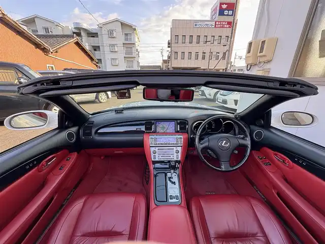 レクサス ＳＣ 430 三重県 2007(平19)年 7.6万km ホワイトパールクリスタルシャイン ♪走行75675km/♪電動オープン/♪マークレビンソン/赤革シート/前席メモリ付パワーシート/前席シートヒーター/純正ナビ/・DTV・CD6連チェンジャー・MD/バックカメラ/前後ドライブレコーダー/HIDヘッドライト/フォグライト/オートライト/電格ミラー/クルーズコントロール/ウッドコンビステアリング/ステアリングスイッチ/ウッドパネル/フロアマット/ETC/サイド/ニーエアバック