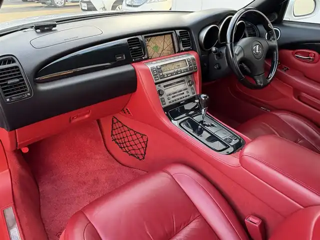 レクサス ＳＣ 430 三重県 2007(平19)年 7.6万km ホワイトパールクリスタルシャイン ♪走行75675km/♪電動オープン/♪マークレビンソン/赤革シート/前席メモリ付パワーシート/前席シートヒーター/純正ナビ/・DTV・CD6連チェンジャー・MD/バックカメラ/前後ドライブレコーダー/HIDヘッドライト/フォグライト/オートライト/電格ミラー/クルーズコントロール/ウッドコンビステアリング/ステアリングスイッチ/ウッドパネル/フロアマット/ETC/サイド/ニーエアバック