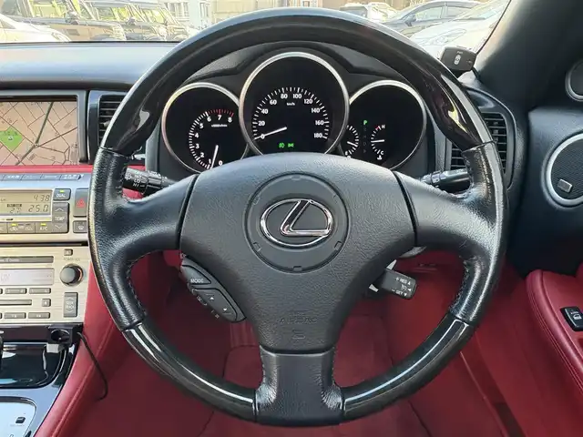 レクサス ＳＣ 430 三重県 2007(平19)年 7.6万km ホワイトパールクリスタルシャイン ♪走行75675km/♪電動オープン/♪マークレビンソン/赤革シート/前席メモリ付パワーシート/前席シートヒーター/純正ナビ/・DTV・CD6連チェンジャー・MD/バックカメラ/前後ドライブレコーダー/HIDヘッドライト/フォグライト/オートライト/電格ミラー/クルーズコントロール/ウッドコンビステアリング/ステアリングスイッチ/ウッドパネル/フロアマット/ETC/サイド/ニーエアバック