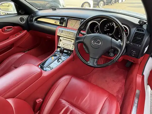 レクサス ＳＣ 430 三重県 2007(平19)年 7.6万km ホワイトパールクリスタルシャイン ♪走行75675km/♪電動オープン/♪マークレビンソン/赤革シート/前席メモリ付パワーシート/前席シートヒーター/純正ナビ/・DTV・CD6連チェンジャー・MD/バックカメラ/前後ドライブレコーダー/HIDヘッドライト/フォグライト/オートライト/電格ミラー/クルーズコントロール/ウッドコンビステアリング/ステアリングスイッチ/ウッドパネル/フロアマット/ETC/サイド/ニーエアバック