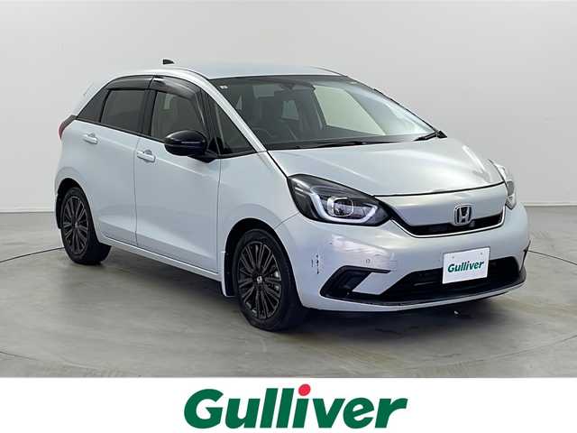 ホンダ フィット e:HEVホーム メゾン 栃木県 2021(令3)年 3.5万km 白 純正ナビ/（BT/Apple CarPlay/Android Auto/フルセグ/AM/FM)/ホンダセンシング/衝突軽減システム/車線逸脱抑制機能/パーキングサポートブレーキ/先行車発進お知らせ　/横滑り防止　/標識認識機能　/追従走行付きクルーズコントロール　/電動格納ミラー/ステアリングスイッチ/純正アルミホイール/純正フロアマット/ETC2.0　/ドライブレコーダー/プッシュスタート/スマートキー