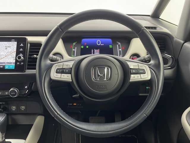 ホンダ フィット e:HEVホーム メゾン 栃木県 2021(令3)年 3.5万km 白 純正ナビ/（BT/Apple CarPlay/Android Auto/フルセグ/AM/FM)/ホンダセンシング/衝突軽減システム/車線逸脱抑制機能/パーキングサポートブレーキ/先行車発進お知らせ　/横滑り防止　/標識認識機能　/追従走行付きクルーズコントロール　/電動格納ミラー/ステアリングスイッチ/純正アルミホイール/純正フロアマット/ETC2.0　/ドライブレコーダー/プッシュスタート/スマートキー