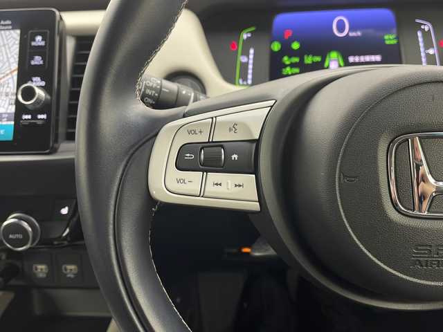 ホンダ フィット e:HEVホーム メゾン 栃木県 2021(令3)年 3.5万km 白 純正ナビ/（BT/Apple CarPlay/Android Auto/フルセグ/AM/FM)/ホンダセンシング/衝突軽減システム/車線逸脱抑制機能/パーキングサポートブレーキ/先行車発進お知らせ　/横滑り防止　/標識認識機能　/追従走行付きクルーズコントロール　/電動格納ミラー/ステアリングスイッチ/純正アルミホイール/純正フロアマット/ETC2.0　/ドライブレコーダー/プッシュスタート/スマートキー