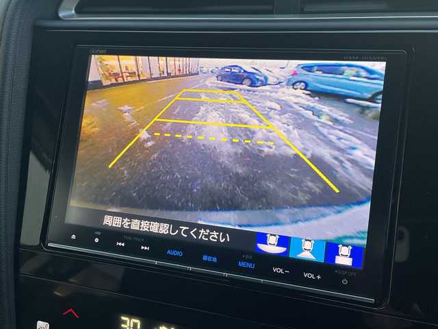 ホンダ シャトル ハイブリッド Z 新潟県 2015(平27)年 6.3万km ティンテッドシルバーM 純正8インチナビ　/　CD/DVD/BT/USB/SD/フルセグＴＶ　/あんしんパッケージ/　シティブレーキアクティブシステム/　サイドカーテンエアバッグシステム/　誤発進抑制機能/コンフォートビューパッケージ/　親水/ヒーテッドドアミラー/　フロントドア撥水ガラス/　熱線入りフロントウインドウ/バックカメラ　/コーナーセンサー/シートヒーター　/ハーフレザーシート/クルーズコントロール　/純正アルミホイール１６インチ　/ＬＥＤオートヘッドライト/フォグランプ/プッシュスタート/スマートキー/パドルシフト/革巻きステアリング/電動格納ウインカーミラー/ステアリングスイッチ/ＥＴＣ　/純正フロアマット　/ドアバイザー