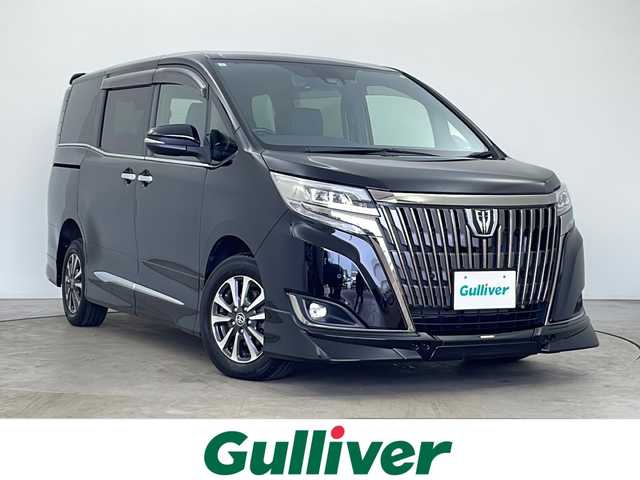 トヨタ エスクァイア Gi プレミアムパッケージ ブラックテーラード 秋田県 2021(令3)年 1.8万km ブラック アルパインメモリーナビ 【BT/CD/DVD/HDMI】/フルセグTV/両側パワースライドドア　/社外フリップダウンモニター　/純正エンジンスターター /ビルトインETC /純正エアロ　/ハーフレザーシート　/革巻きステアリング/ステアリングリモコン/ステアリングヒーター　/プッシュスタート /スマートキー　/スペアキー有り/純正AW/トヨターセーフティンス/クリアランスソナー /横滑り防止装置/前席シートヒーター/寒冷地仕様/デジタルインナーミラー/クルーズコントロール/保証書/取扱説明書