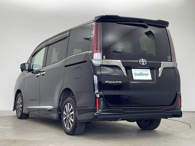 トヨタ エスクァイア Gi プレミアムパッケージ ブラックテーラード 秋田県 2021(令3)年 1.8万km ブラック アルパインメモリーナビ 【BT/CD/DVD/HDMI】/フルセグTV/両側パワースライドドア　/社外フリップダウンモニター　/純正エンジンスターター /ビルトインETC /純正エアロ　/ハーフレザーシート　/革巻きステアリング/ステアリングリモコン/ステアリングヒーター　/プッシュスタート /スマートキー　/スペアキー有り/純正AW/トヨターセーフティンス/クリアランスソナー /横滑り防止装置/前席シートヒーター/寒冷地仕様/デジタルインナーミラー/クルーズコントロール/保証書/取扱説明書