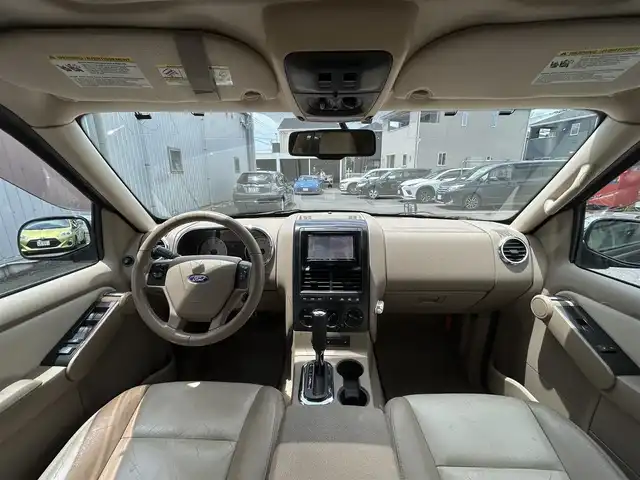 フォード エクスプローラー XLT 静岡県 2009(平21)年 10.2万km 黒 ユーザー買取車両/純正HDDナビ（CN-RA03D）/【CD/DVD/地デジTV】/純性AW17インチ/サンルーフ/バックカメラ/レザーシート/3列シート/ベンチシート/ルーフレール/純性フロアマット/シートヒーター/ETC/純性LEDライト