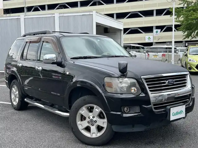 フォード エクスプローラー XLT 静岡県 2009(平21)年 10.2万km 黒 ユーザー買取車両/純正HDDナビ（CN-RA03D）/【CD/DVD/地デジTV】/純性AW17インチ/サンルーフ/バックカメラ/レザーシート/3列シート/ベンチシート/ルーフレール/純性フロアマット/シートヒーター/ETC/純性LEDライト