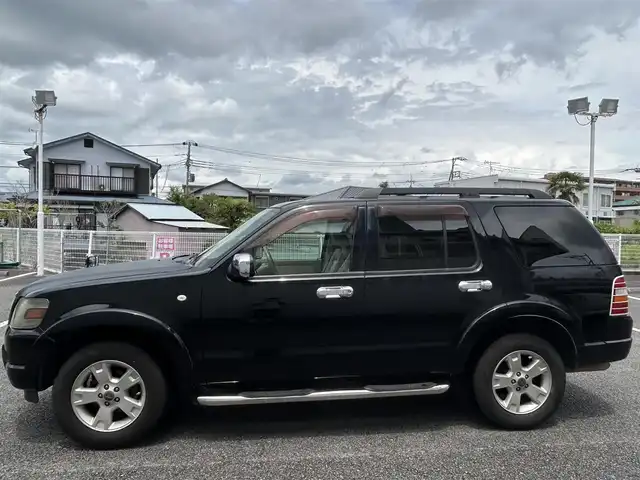フォード エクスプローラー XLT 静岡県 2009(平21)年 10.2万km 黒 ユーザー買取車両/純正HDDナビ（CN-RA03D）/【CD/DVD/地デジTV】/純性AW17インチ/サンルーフ/バックカメラ/レザーシート/3列シート/ベンチシート/ルーフレール/純性フロアマット/シートヒーター/ETC/純性LEDライト