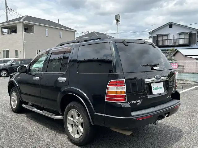 フォード エクスプローラー XLT 静岡県 2009(平21)年 10.2万km 黒 ユーザー買取車両/純正HDDナビ（CN-RA03D）/【CD/DVD/地デジTV】/純性AW17インチ/サンルーフ/バックカメラ/レザーシート/3列シート/ベンチシート/ルーフレール/純性フロアマット/シートヒーター/ETC/純性LEDライト