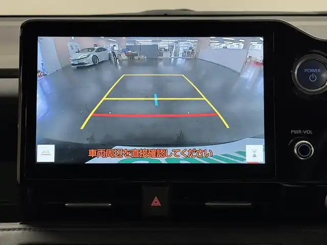 トヨタ ヴォクシー ハイブリッド S－Z 三重県 2022(令4)年 5.8万km アティチュードブラックマイカ ハイブリッド/FF/インパネCVT/純正 10.5インチ ディスプレイオーディオplus（ナビ搭載）/（AM/FM/TV/CD/DVD/USB/iPod/Miracast/CarPlay/AndroidAuto）/純正 14インチOLED（有機EL）後席フリップダウンモニター V14T-R72R/バックガイドモニター/【OP】両側ハンズフリーパワースライドドア/ビルトインETC2.0/Toyota Safety Sense/●プリクラッシュセーフティ/●レーンディパーチャーアラート/●レーダークルコン（全車速追従機能付）/●【OP】アダプティブハイビームシステム*1/・インテリジェントクリアランスソナー［パーキングサポートブレーキ（静止物）］/・ロードサインアシスト/・プロアクティブドライビングアシスト［PDA］/・発進遅れ告知［TMN］/装備/【OP】快適＆利便パッケージ（High）/●2ndシートオットマン＆ヒーター/●ステアリングヒーター/●パワーバックドア/・オートライト/・【OP】プロジェクター式LEDヘッドランプ*1/・ハーフレザーシート/・快適温熱シート（D/N）/・AC100V アクセサリーコンセント（1500W）/・電子パーキングブレーキ/・保/取/マルチ取/・スマートキーx2/など/*1…セットでOP