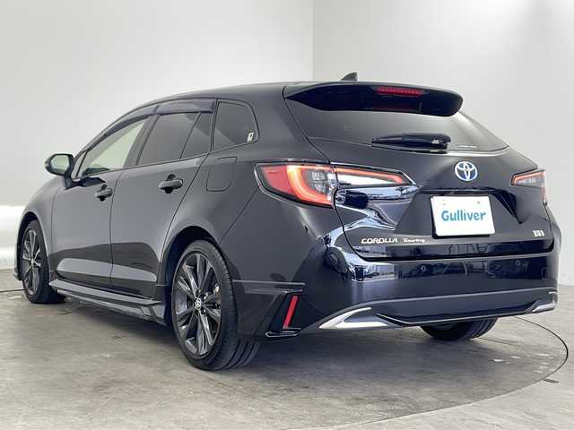 トヨタ カローラツーリング ハイブリッド ダブルバイビー 兵庫県 2023(令5)年 2.3万km アティチュードブラックマイカ ・純正8インチディスプレイオーディオ/　Bluetoothオーディオ/　USB接続/　フルセグテレビ/・バックカメラ/・ビルドインETC/・Toyota Safety Sense/　プリクラッシュセーフティ/　レーンディパーチャーアラート/　オートマチックハイビーム/・先行車発進告知機能/・パーキングサポートブレーキ（前後方静止物）/・車両接近通報装置/・レーダークルーズコントロール/・前方ドライブレコーダー/・社外フロアマット/・ハーフレザーシート/・シートヒーター（運転席・助手席）/・モデリスタエアロパーツ（フロント）/・純正17インチアルミホイール/・ABS/・横滑り防止機能/・前後コーナーセンサー/・盗難防止装置/・オートライト/・LEDヘッドライト/・Wエアバック/・スマートキー/・AACエアコン