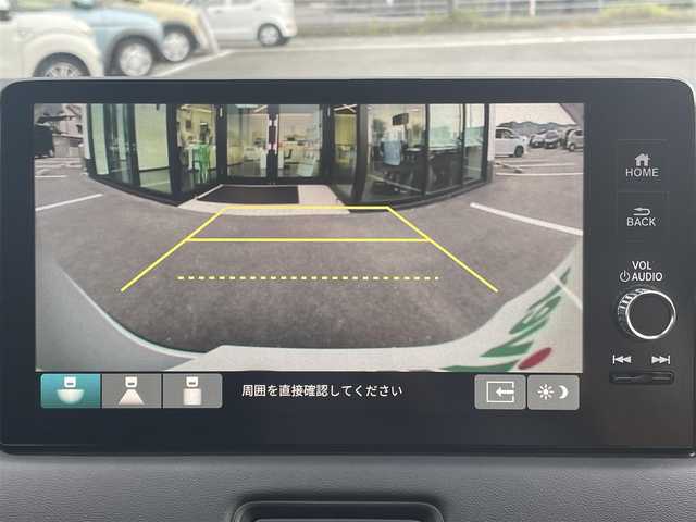 ホンダ ヴェゼル ハイブリッド e:HEV X 愛媛県 2022(令4)年 2.4万km プレミアムサンライトホワイトパール 純正ナビ（Bluetooth/HDD/フルセグテレビ）/追従クルーズコントロール/バックカメラ/前方ドライブレコーダー/パドルシフト/パーキングセンサー/ETC2.0/ABS/横滑り防止装置/前後コーナーセンサー/レーンキープアシスト/衝突被害軽減システム/ダウンヒルアシストコントロール/純正フロアマット/純正16インチアルミホイール/カーテンエアバック/置くだけ充電/USB入力端子/LEDヘッドライト/オートライト