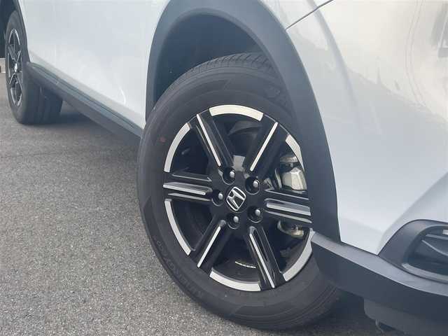 ホンダ ヴェゼル ハイブリッド e:HEV X 愛媛県 2022(令4)年 2.4万km プレミアムサンライトホワイトパール 純正ナビ（Bluetooth/HDD/フルセグテレビ）/追従クルーズコントロール/バックカメラ/前方ドライブレコーダー/パドルシフト/パーキングセンサー/ETC2.0/ABS/横滑り防止装置/前後コーナーセンサー/レーンキープアシスト/衝突被害軽減システム/ダウンヒルアシストコントロール/純正フロアマット/純正16インチアルミホイール/カーテンエアバック/置くだけ充電/USB入力端子/LEDヘッドライト/オートライト